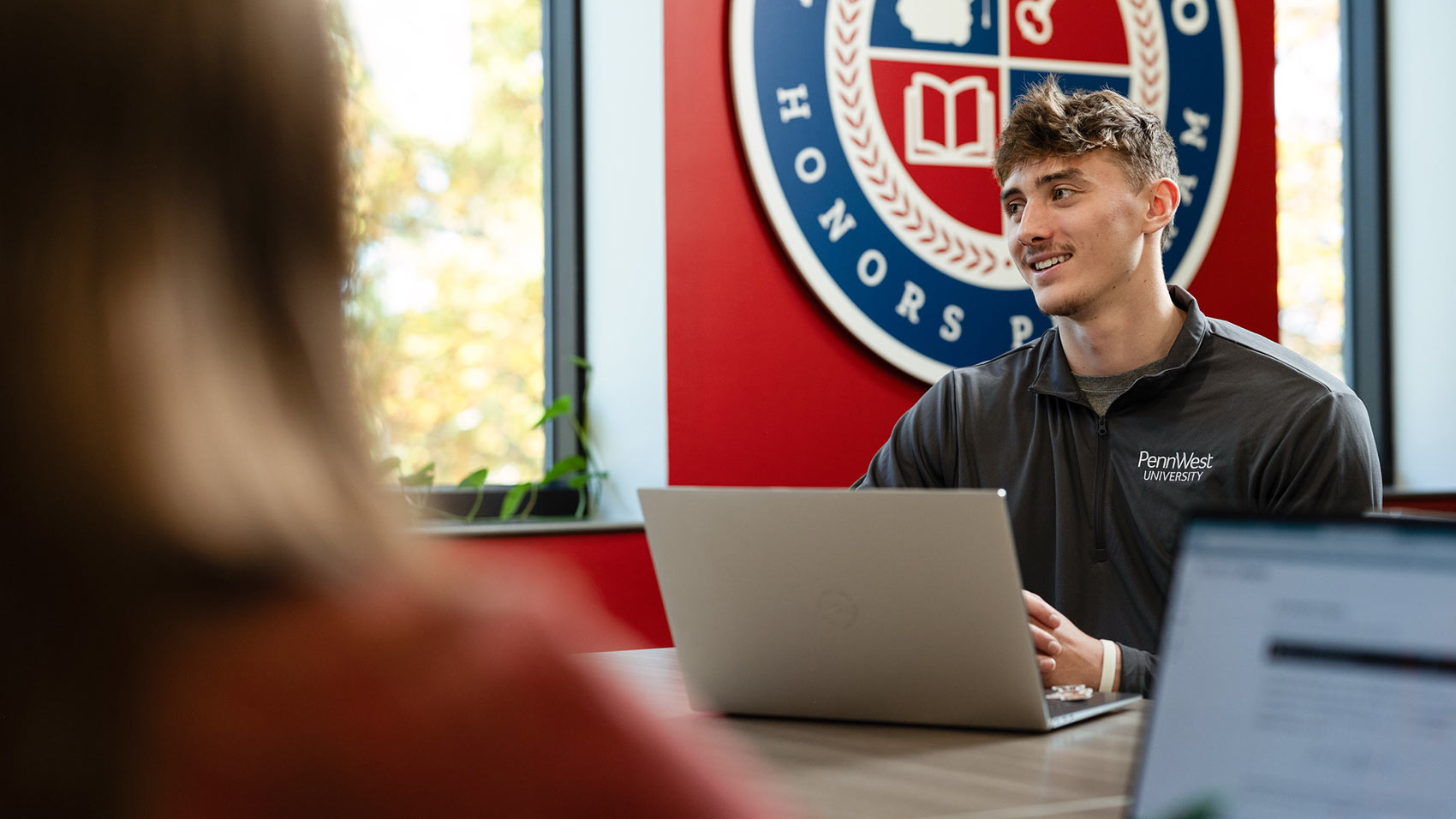 Student working on a project at PennWest University.